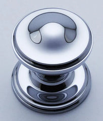 Bold 100mm center door knob with a substantial design, available in premium finishes like polished brass, chrome, and satin chrome. Adds sophistication to residential or commercial entrances.
